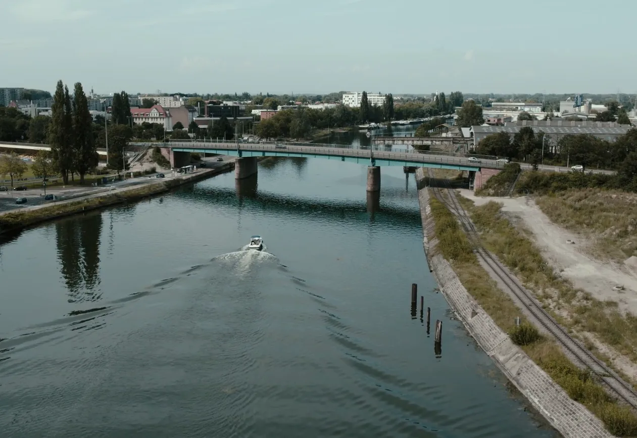 A city river and bridge, seen from above